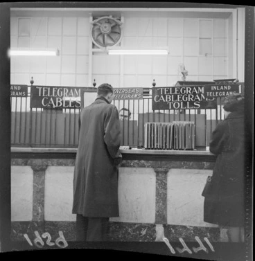 Image: Telegram office, showing unidentified man standing at counter