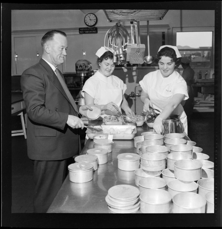 Image: Unidentified staff at Wellington Hospital, in kitchen, preparing food for 'Meals on Wheels' service