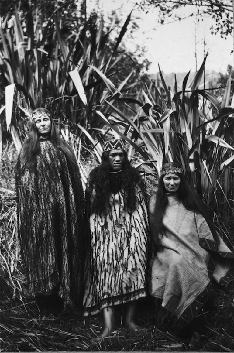 Image: Three women wearing cloaks