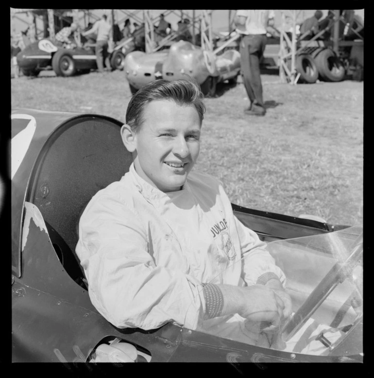 Image: Portrait of Bruce McLaren in his Cooper-Climax race car at Ardmore Aerodrome Racetrack, South Auckland