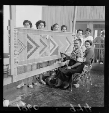 Image: Māori women working on a tukutuku panel for a meeting house at Waiwhetu Marae, Lower Hutt