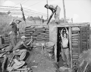 Image: Laying of a sandbagged test point for the Divisional Signals telephone circuit, Korea