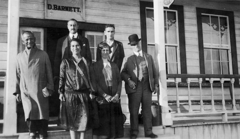 Image: Group, including Sir Apirana Ngata, Whina Cooper and George Forbes, on the steps of the Opononi Hotel