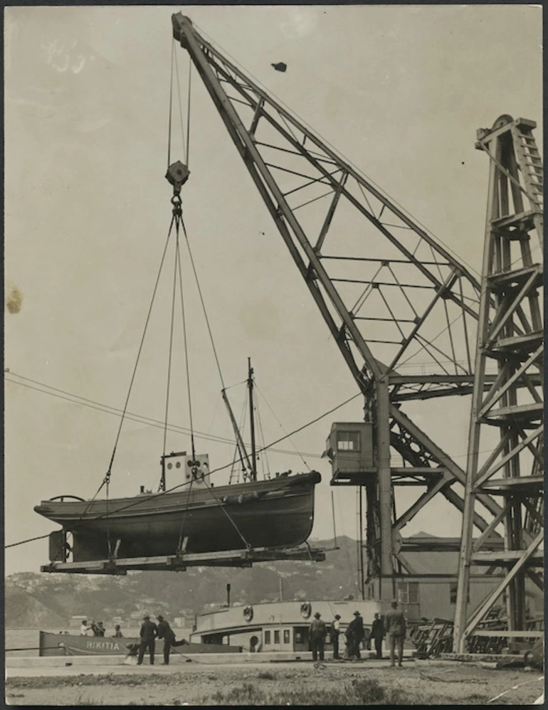 Image: Floating Crane `Hikitia' lifting the Uta into the water from the breastwork at Thorndon, Wellington Harbour