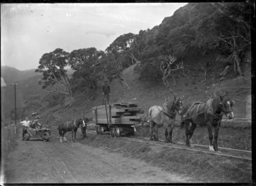 Image: Horse-drawn rail timber wagon laden with sawn timber, near Karekare.