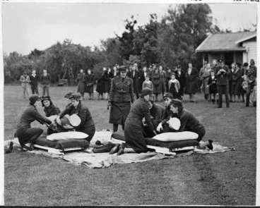 Image: Members of the ambulance section of the Manawatu Service Women's Auxillary Corps giving a demonstration in Milverton Park, Palmerston North during World War II
