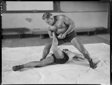 Image: Unidentified wrestler's, demonstrating a wrestling move