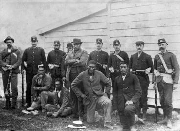 Image: Policemen with a group of Maori who participated in the Dog Tax Rebellion