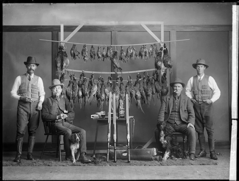 Image: Hunting party with catch of birds