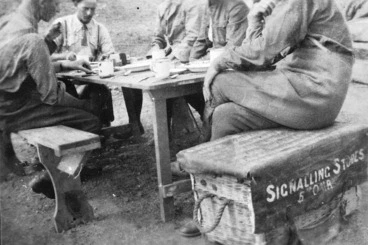 Image: Four soldiers at breakfast, Limnos, Greece