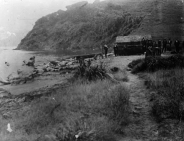 Image: At Te Awaiti, showing a group of whalers near a thatched shed