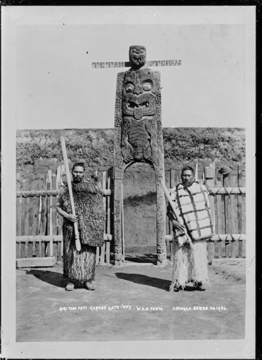 Image: Hurae Puketapu and Te Whenuanui, standing alongside a carved wooden gateway - Photograph taken by William Augustus Neale