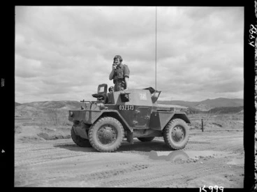 Image: Major K G Miles operating the radio in his scout car, Korea - Photograph taken by Ian Mackley