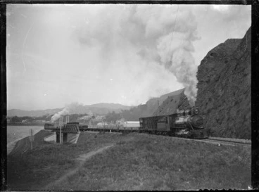 Image: Wellington and Manawatu Railway Co goods train leaving Wellington; class Ob & Wa locomotives.