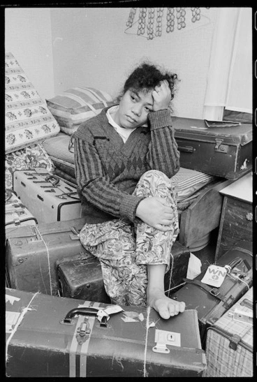 Image: Ana Likio at her home in Waitangirua, surrounded by luggage - Photograph taken by Ray Pigney