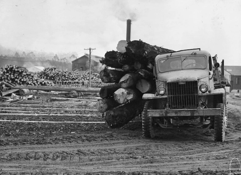 Image: Logging truck off-loading timber