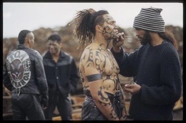 Image: Application of ta moko design on Toa gang member during filming of Once were warriors, Auckland
