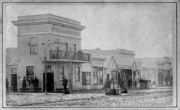 Image: Gladstone St, Westport, showing McFarlane's Hotel and shops