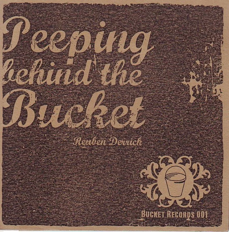 Image: Peeping behind the bucket [electronic resource] / Reuben Derrick.