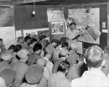 Image: Royal New Zealand Air Force briefing before an air strike, Guadalcanal, Solomon Islands, during World War II