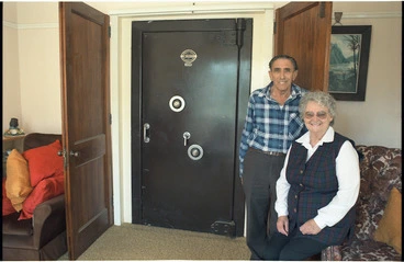 Image: Joe and Pauline North alongside the old Reserve Bank vault inside their house at Rata Street, Naenae, Lower Hutt - Photograph taken by Melanie Burford