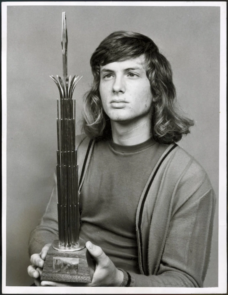 Image: John Piper with the Benson & Hedges Supreme Award for New Zealand Fashion Design trophy