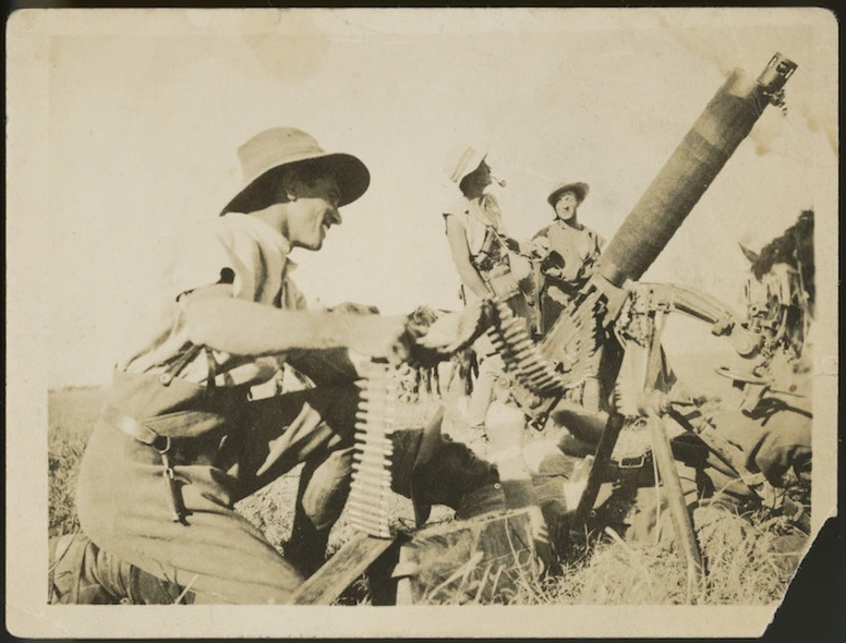 Image: Soldiers firing at an enemy aircraft