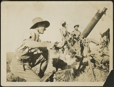 Image: Soldiers firing at an enemy aircraft