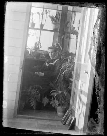Image: Robina Nicol seated in glazed verandah