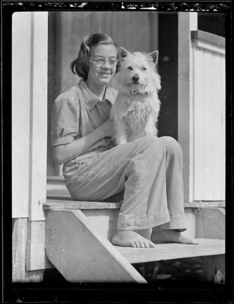 Image: Denise Armstrong outside cottage at Woolley's Bay