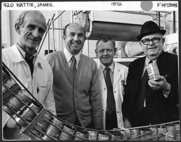 Image: Sir James Wattie with three of his long-serving employees, by the production line for tinned spaghetti at the Wattie's factory in Hastings