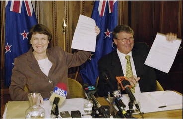Image: Prime Minister elect Helen Clark and Alliance Party leader Jim Anderton with the newly signed coalition agreement after the 1999 general election - Photograph taken by Maarten Holl