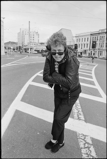 Image: Dave Dobbyn of musical group DD Smash standing on the corner of Kent Terrace and Oriental Parade, Wellington - Photograph taken by Phil Reid