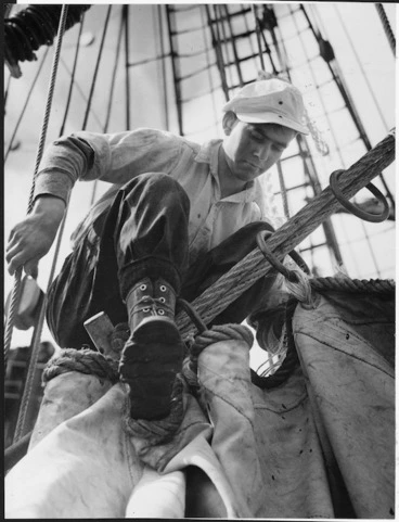 Image: Graeme Sheppard working on a jigger staysail aboard the ship Pamir, Wellington