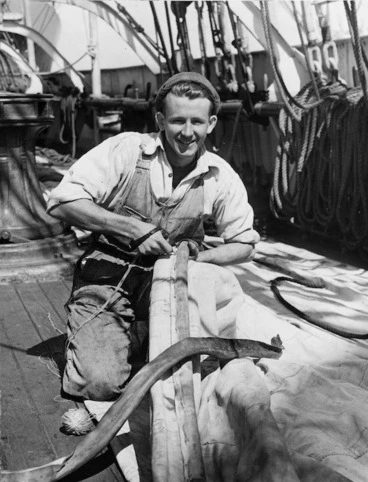 Image: George Gunn repairing a sail aboard the ship Pamir, Wellington