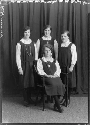 Image: Four unidentified young women in pinafores, Home of Compassion, Wellington