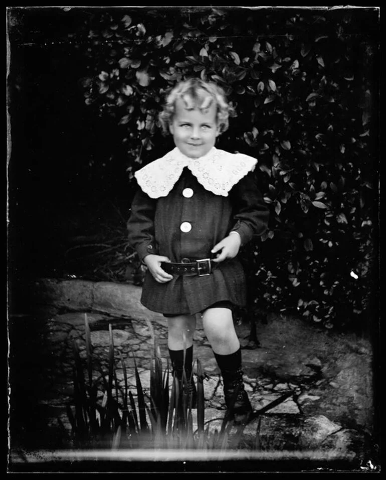 Image: Small boy in garden