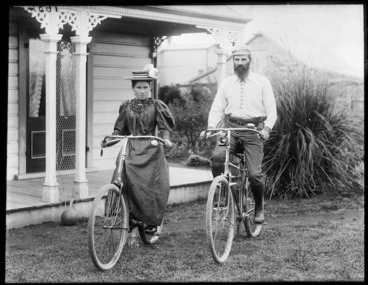 Image: Two members of the Curtis family on bicycles