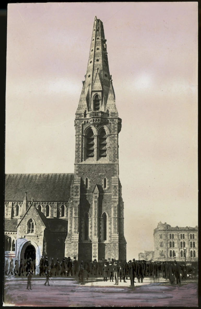 Image: Creator unknown :Photograph of crowd outside Christ Church Cathedral with earthquake damage to spire, Christchurch