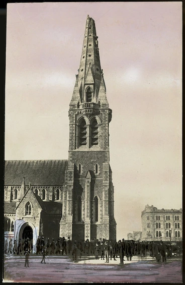 Image: Creator unknown :Photograph of crowd outside Christ Church Cathedral with earthquake damage to spire, Christchurch