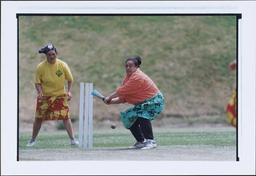 Image: Vitoria and Mativa Faasoo playing Samoan style cricket, or kirikiti, at Wakefield Park, Island Bay, Wellington - Photograph taken by Ray Pigney