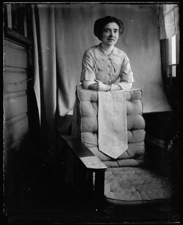 Image: Woman leaning on chair