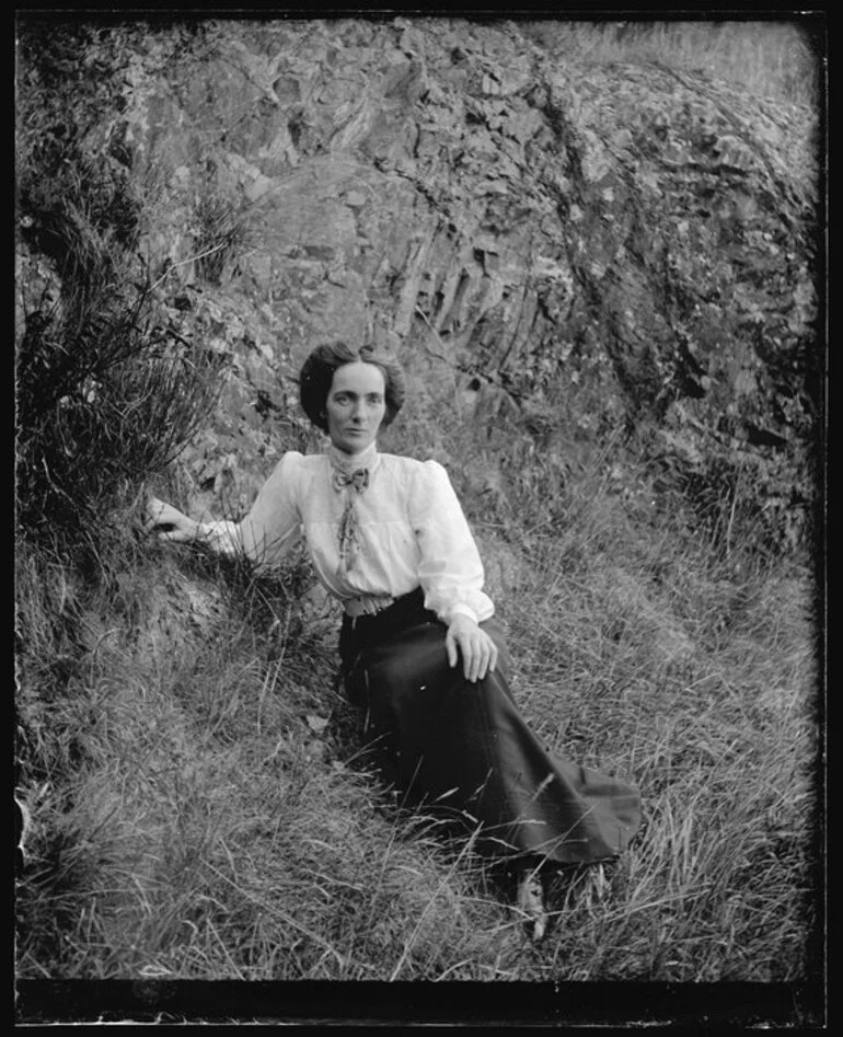 Image: Woman on bank