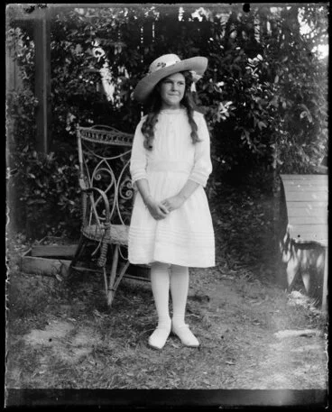 Image: Young girl in garden