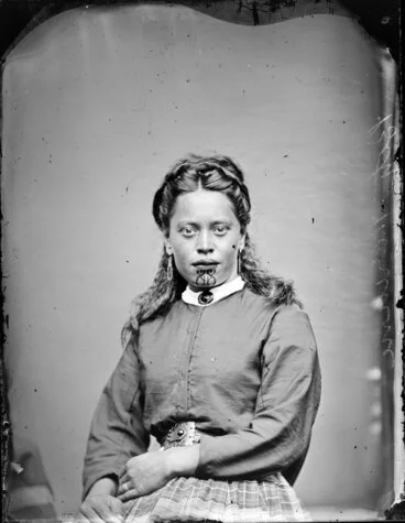 Image: Unidentified young Maori woman with clear chin moko