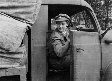 Image: Woman driving a post and telegraph truck during World War II