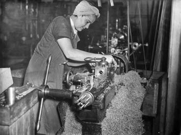 Image: Woman operating a metal lathe during World War II