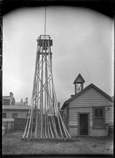 Image: The Petone Fire Station, with hoses hanging up to dry, after the fire at Bailey, Austin & Arcus timber yards, 1910.