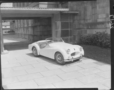 Image: T.R.2 sports car outside art gallery