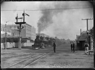 Image: The Rotorua express leaving Auckland, alongside Customs Street East, 1909.